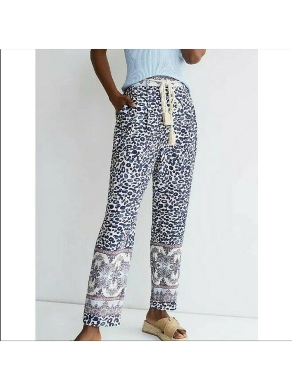 Anthropologie Ollari New York Tasseled
Tapered Pants Blue Animal Print size XS